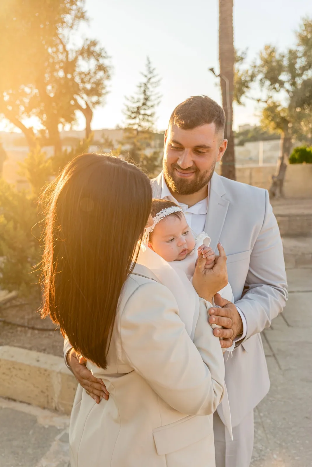 family christening portrait at sunset malta