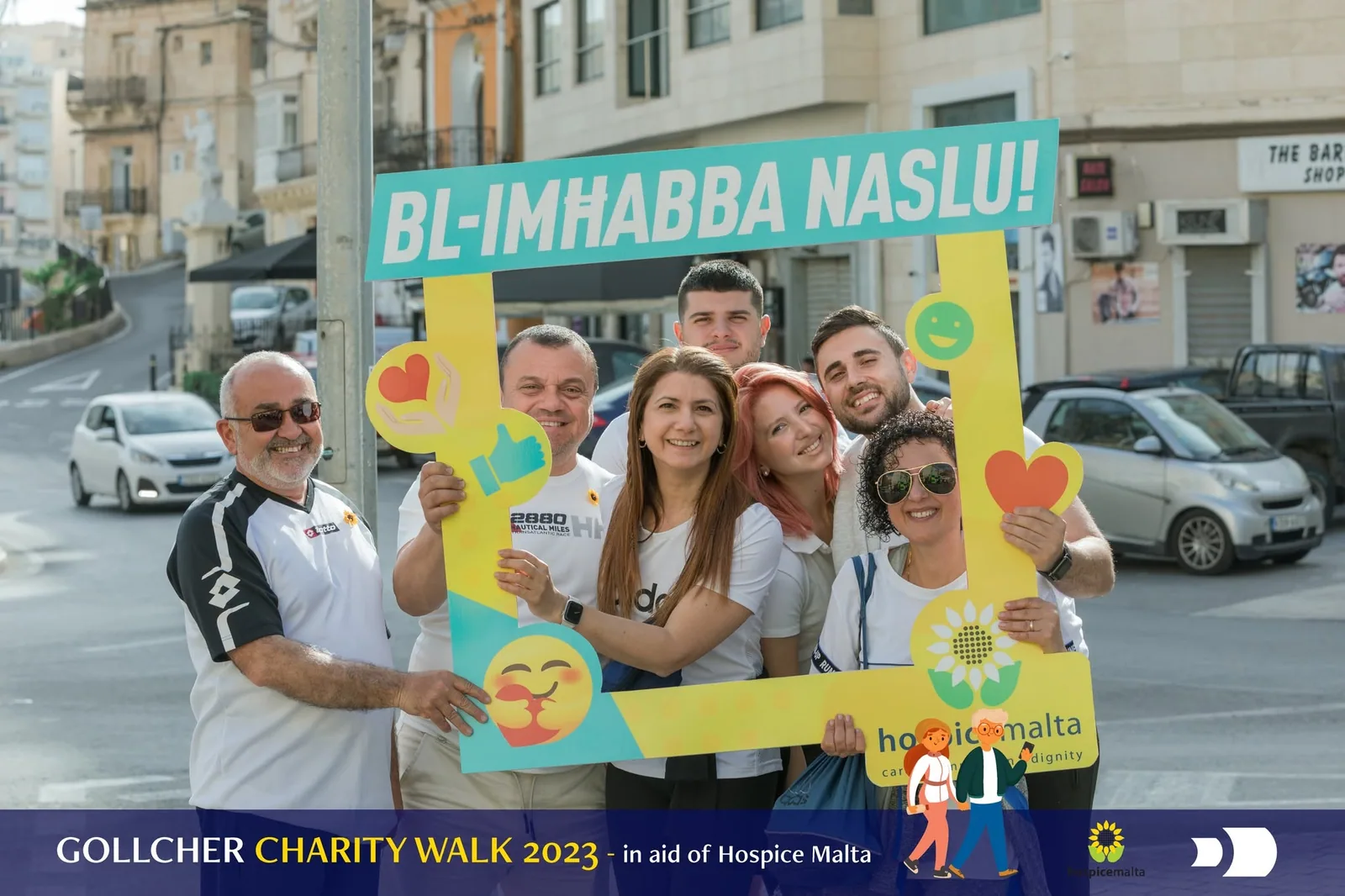 charity walk guests with photo frame malta