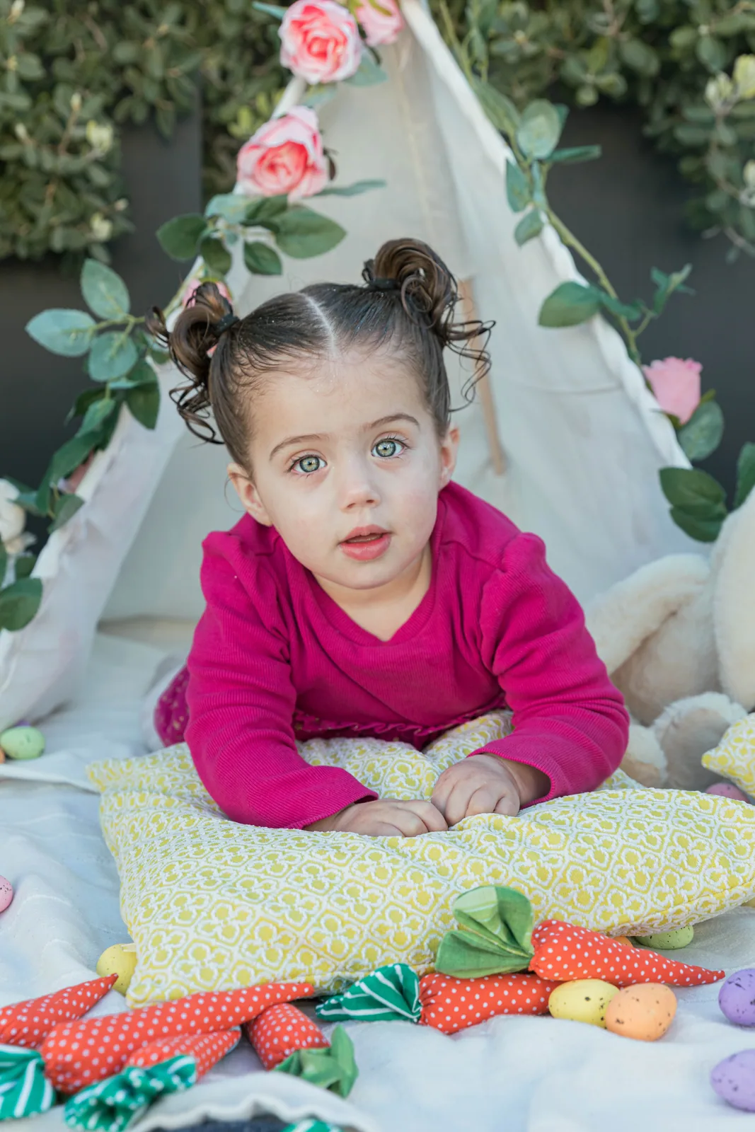 girl playing at floral teepee malta