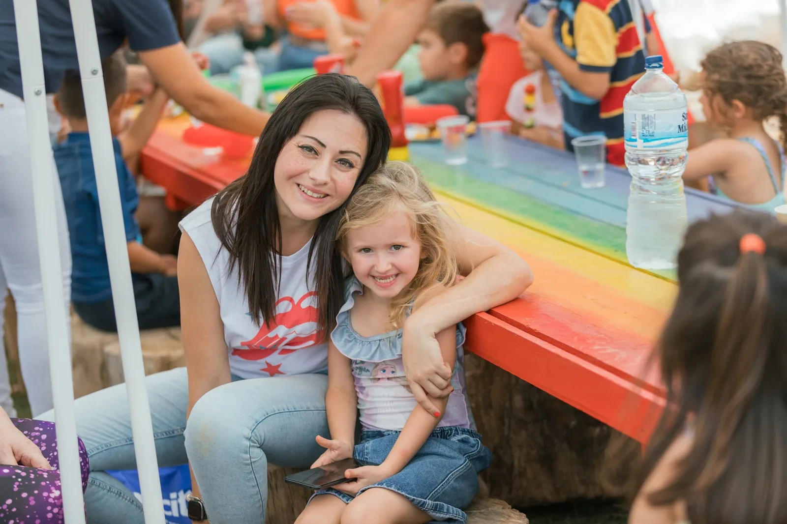 mother and daughter at rainbow party table malta