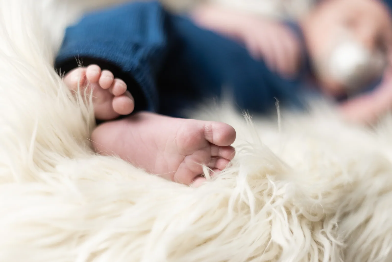 newborn baby feet on soft blanket malta
