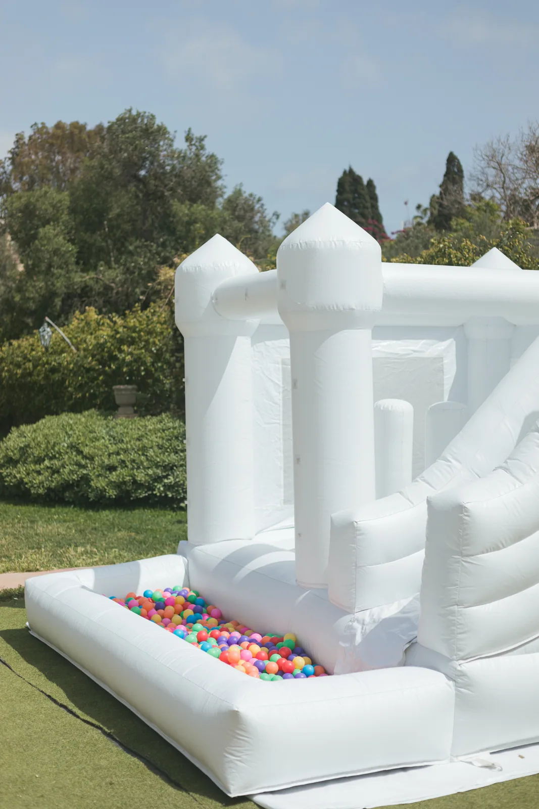 white bouncy castle in garden malta