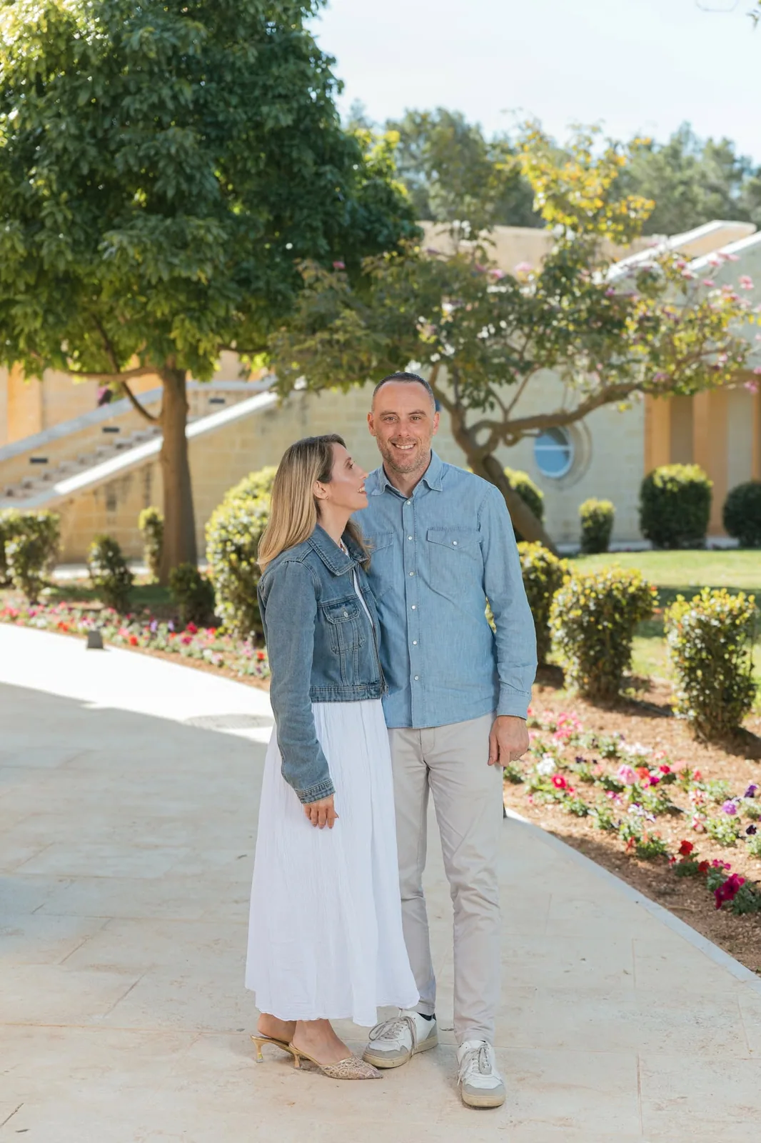 couple standing together on garden path malta