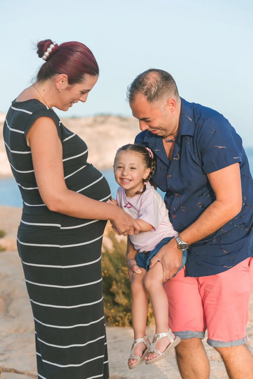 family maternity portrait on coast malta