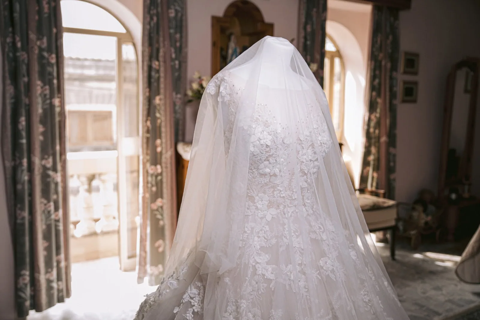 bridal veil and lace dress from behind malta