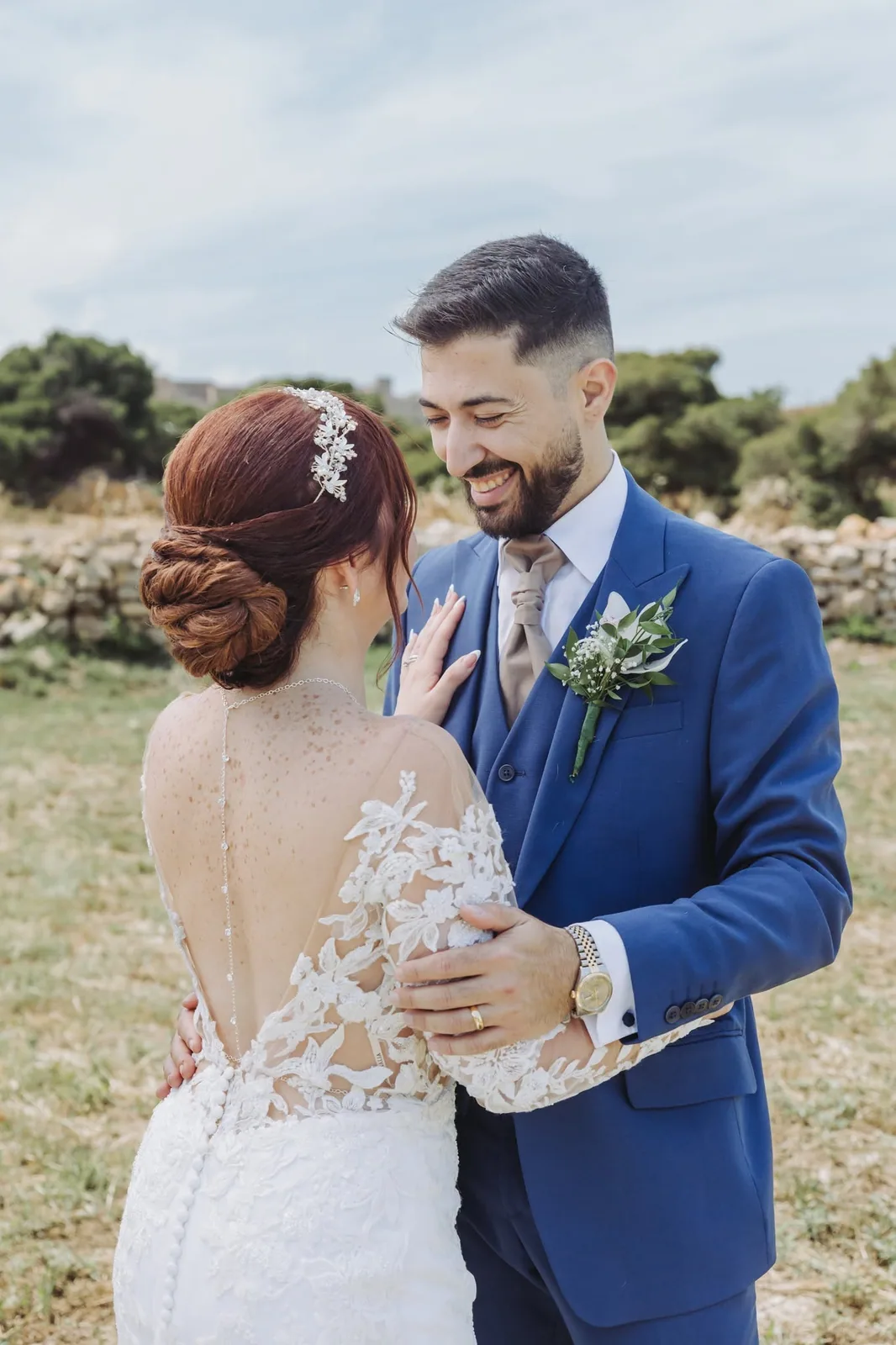 bride and groom holding hands in garden malta