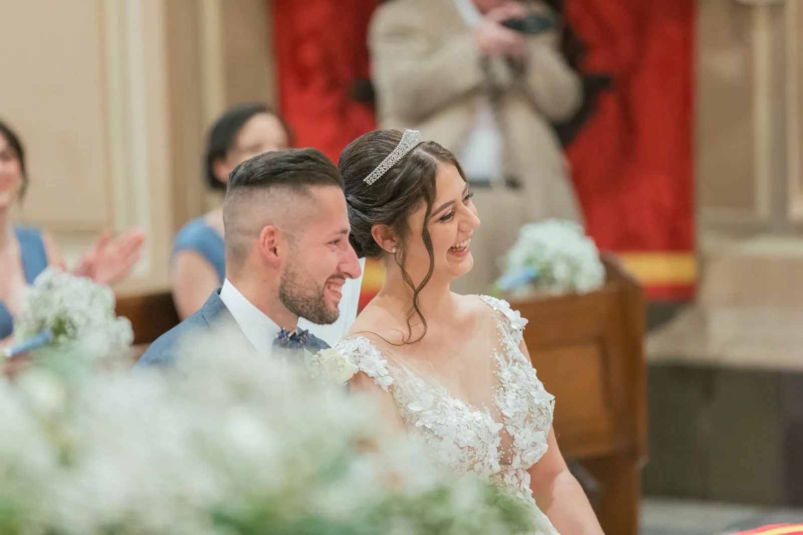bride and groom seated during church ceremony malta