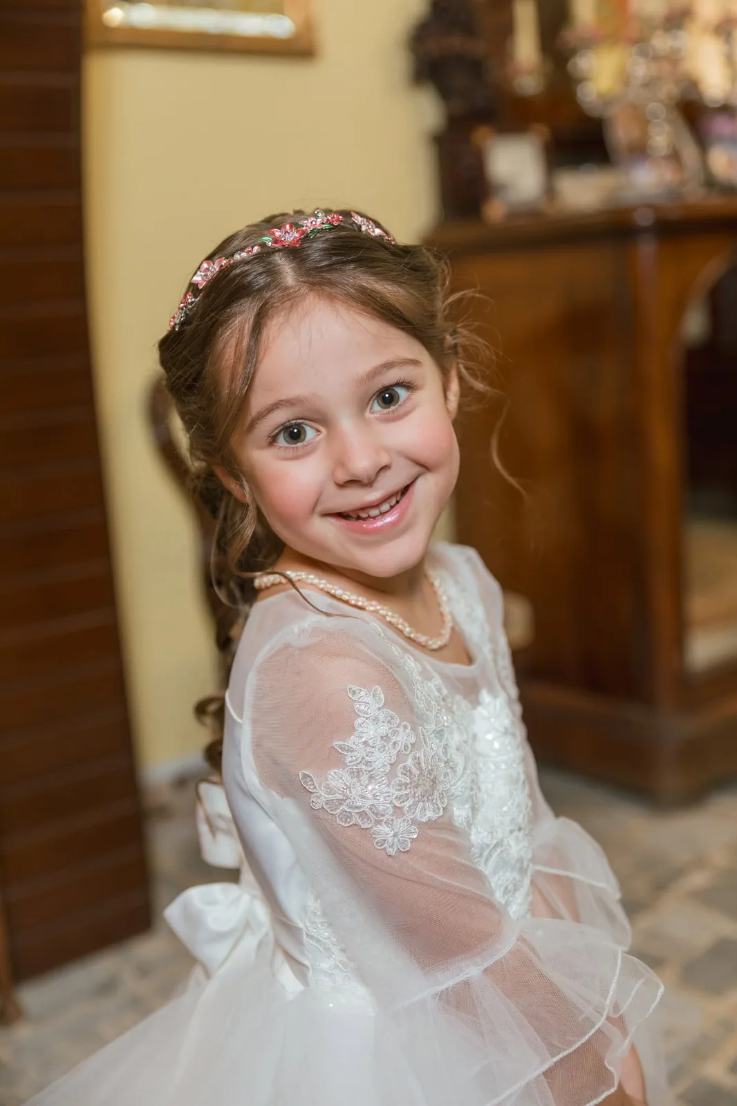 smiling flower girl in white dress malta