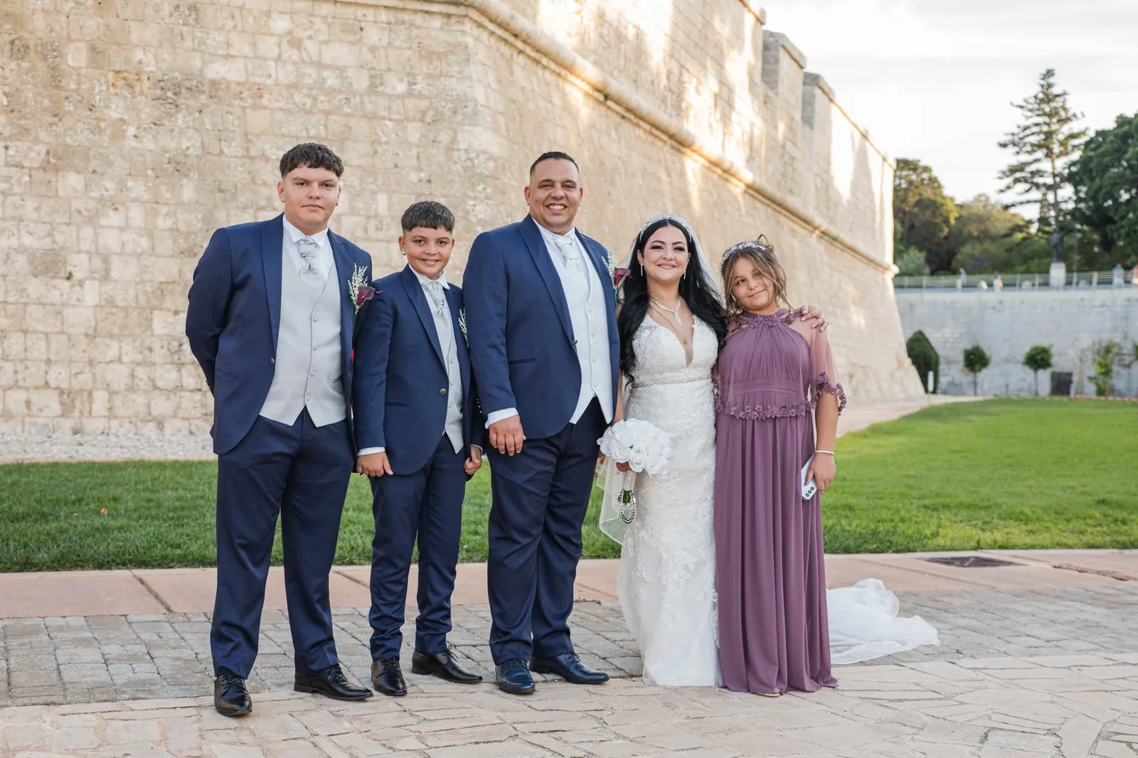 wedding family portrait by stone wall malta